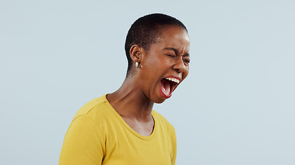 Image showing Stress, anxiety and angry black woman screaming in studio with broken heart, grief or fear on grey background. Psychology, depression and African female model shouting with trauma, conflict or crisis