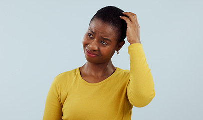 Image showing Confused, thinking and black woman scratching head in studio with why, brainstorming or solution on grey background. Questions, doubt and model with emoji gesture for problem solving, how or forget