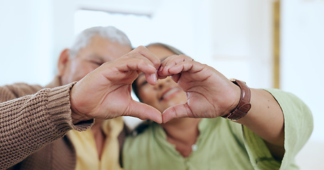 Image showing Care, heart hands or old couple with support, love or hope in a marriage commitment at home together. Happy, valentines day blur or romantic senior man with smile or elderly woman on anniversary