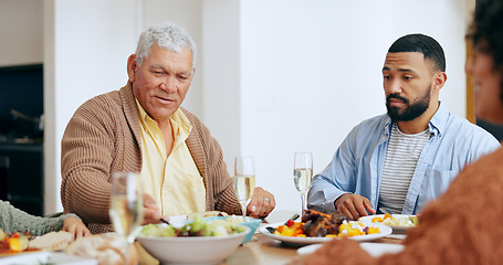 Image showing Food, holidays and a family at the dinner table of their home together for eating a celebration meal. Love, thanksgiving and a group of people in an apartment for festive health, diet or nutrition