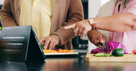 Image showing Senior, hands and cooking in kitchen with tablet for dinner, lunch or vegetables with support, help and love. Elderly, man and woman with pointing, peace and nutrition for bonding or relationship