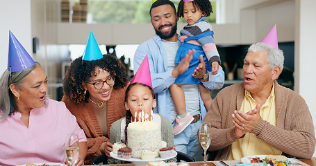 Image showing Birthday cake, family and child blow candles with grandparents for celebration, party and singing or clapping. Happy interracial people, mother and father with girl kids for special holiday at home