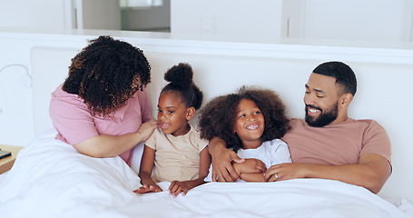 Image showing Home, bed and family with parents, kids and happiness with joy, bonding together and relax with love. Mother, father and children in a bedroom, funny or laughter with peace, morning and weekend break