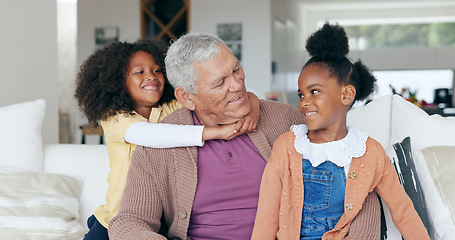 Image showing Happy, hug and grandfather on sofa with children for bonding, relationship and relax at home. Family, love and young girls embrace grandpa for trust, care and affection in living room on weekend