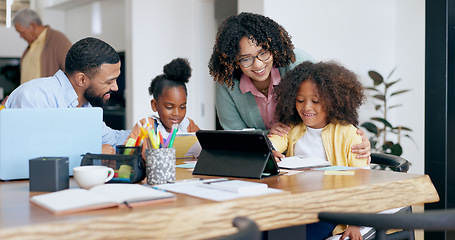 Image showing Parents, children and e learning with tablet, laptop and support for education, development and study at desk. Mother, father and kids with computer, online course and home school in family house