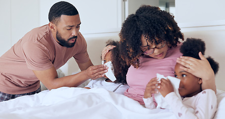 Image showing Children, sick and bed with parents, tissue for nose, mom, dad and busy for healthcare, medical and monitor. Family, girl and support for flu, headache and care for infection, cold and temperature