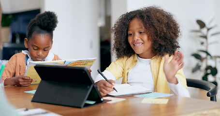 Image showing Children, e learning and tablet with writing, wave hello or book for education, development or study at desk. Kids, touchscreen and notebook with smile, online course and home school in family house