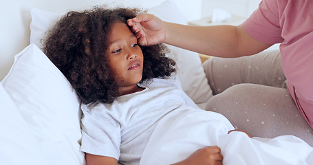 Image showing Sick, children or a girl with a fever in bed to relax or recover and a parent in the home to care or check. Family, kids and an unhealthy female child in the bedroom of an apartment with an illness