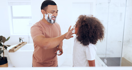 Image showing Father, son and shaving cream in bathroom, playful and morning routine in mirror, skincare and boy. Facial, cosmetic and bonding together with parent, family home or fun for face grooming treatment