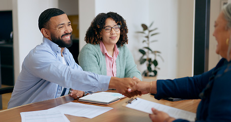 Image showing Couple, handshake and lawyer with documents for real estate, property investment or loan application with smile. People, man and woman with advisor, paperwork and shaking hands for legal deal or will