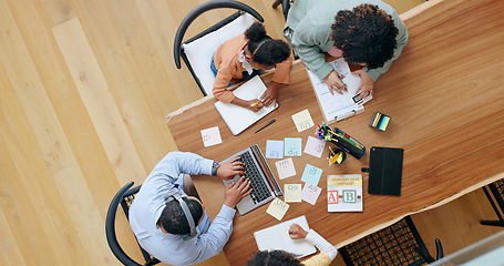 Image showing Parents, children and laptop for work, homeschool and learn with book, colouring and education. Mom, dad and above for child development, write and family home for lesson, knowledge or dining table