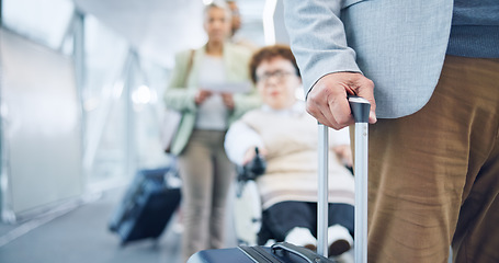 Image showing Hand, luggage and a business person in an airport for travel, waiting in line for boarding a flight closeup. Gate, terminal and a corporate employee with a suitcase for bag on a trip or journey