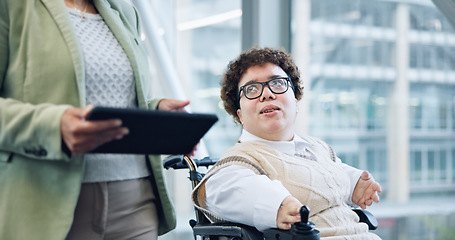 Image showing Tablet, discussion and business woman in wheelchair online for meeting, planning and talking. Office building, corporate team and person with disability in corridor on digital tech for collaboration
