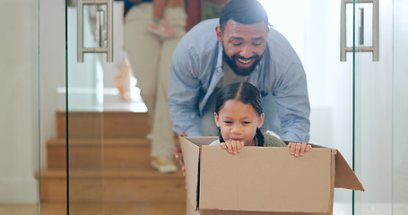 Image showing Dad with child in box, moving and playing in new home with property mortgage, future opportunity and fun. Games, happy father and playful daughter together in apartment, real estate and cardboard.