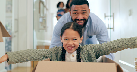 Image showing Father, daughter and playing in box of new home with happiness, fun and bonding for relocation in hallway. Family, man and girl kid in cardboard for celebration or freedom in real estate or apartment