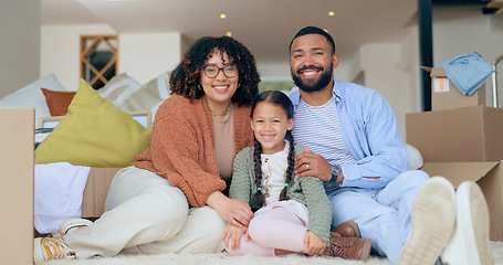 Image showing Portrait of happy family with boxes on floor, new home and property mortgage, future opportunity and security. Mother, father and child together in living room, real estate and moving to apartment