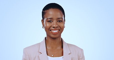 Image showing Portrait, black woman and smile in studio for business, pride and confident lawyer isolated on blue background in Nigeria. Happy legal attorney, employee and expert working for professional career