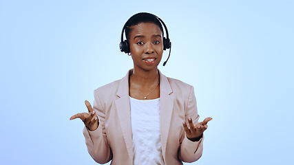 Image showing Call center, studio or portrait of black woman in communication, speaking or talking. Blue background, virtual assistant or African financial advisor with microphone in CRM for support or business