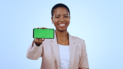 Image showing Business woman, portrait or phone green screen mockup for social media advertising or review. Blue background, happy or African lady with chromakey on mobile app display for marketing space in studio