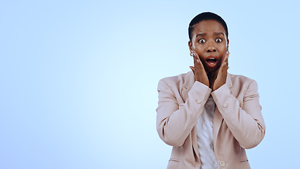 Image showing Woman, portrait or shocked in studio for announcement, notification or overwhelmed on blue background. Black person, hand on face or surprised with wow for gossip, surprise or secret on mock up space