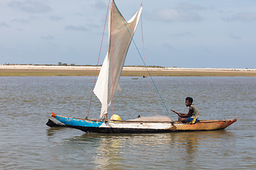 Image showing A fisherman sails back from the sea Morondava, Madagascar