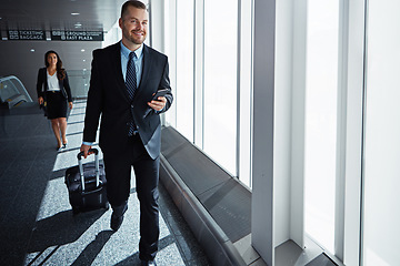 Image showing Business man, woman and phone in airport hallway with smile, thinking or suitcase for international travel. Entrepreneur, luggage and smartphone with flight schedule for global immigration in London