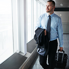 Image showing Walking, flight or businessman in airport thinking of company trip with suitcase or luggage for commute. Proud manager, idea or corporate worker in hall for journey or international travel by window