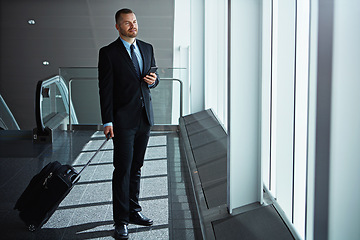 Image showing Waiting, thinking or business man in airport with phone, luggage or suitcase for travel booking. Social media, entrepreneur or corporate worker thinking to chat on mobile app on international flight