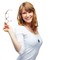Image showing Woman, glasses and fashion in studio portrait with smile, confidence and eye care by white background. Girl, happy and show frame for eyesight, vision and wellness with trendy style, clothes or pride