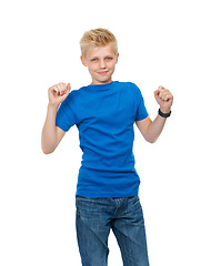 Image showing Teenager, boy and portrait in studio with fist, confidence and casual style for celebration on white background. Person, child and face with happiness, pride and cheering or trendy outfit on mock up