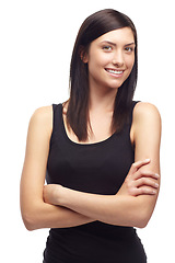 Image showing Woman, happy or portrait with arms crossed, positive or pride mindset for studio mockup. Young model, face and calm attitude with smile, relax wellness and company in about us by white background