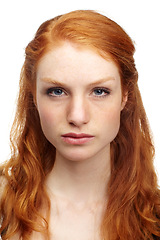 Image showing Serious, girl and woman with portrait, redhead and beauty isolated on a white studio background. Face, person and model with mockup space, confident and hair with peace, Edinburgh and ginger