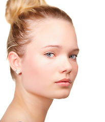 Image showing Girl, teen and portrait or skincare in studio for glow clear, hygiene on white background. Female person, model and face for dermatology confidence for health wellness, calm shine or natural beauty