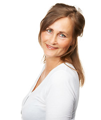 Image showing Confident, portrait and mature woman in a studio with positive, good and happy attitude. Smile, pride and female model from Canada with makeup, cosmetic or beauty face isolated by white background.