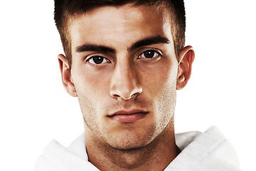 Image showing Portrait, serious and man in hoodie for fashion isolated on a white background. Confident young person, face of model and stylish clothes, casual and cool facial expression in Spain on a backdrop