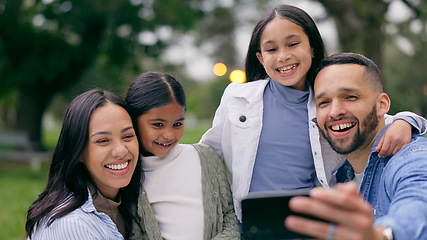 Image showing Park selfie of mother, father and kids bonding on weekend in nature together for morning picnic. Photography, fun and memory for happy family with mom, dad and children in garden with smile and hug.