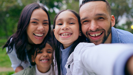 Image showing Park selfie of mom, dad and happy kids with smile, love and bonding on weekend in nature. Photography, fun and memory for family, face of mother and father with children in garden in playful portrait