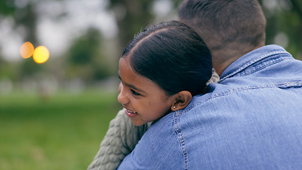 Image showing Outdoor, hug and father with girl, love and care with happiness, vacation and childhood. Family, dad and in a park, embrace and relax with trust, relationship and bonding together with weekend break