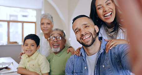 Image showing Happy, big family and selfie in home at dinner, party or together with freedom on holiday or vacation. Parents, child and grandparents smile for social media, memory and photography of event in house