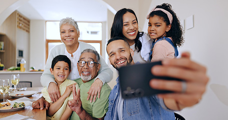 Image showing Happy, big family and selfie in home at dinner, party or together with freedom on holiday or vacation. Parents, children and grandparents smile for social media, memory and photography in house