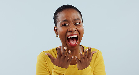 Image showing Excited black woman, portrait and face in surprise for winning, prize or celebration against a studio background. Happy African female person in wow, shock or bonus promotion on sale discount or deal