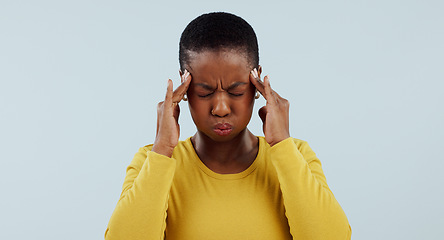 Image showing Frustrated black woman, headache and stress in anxiety, burnout or mistake against a gray studio background. African male person with migraine or mental health in pain, pressure or fail on mockup