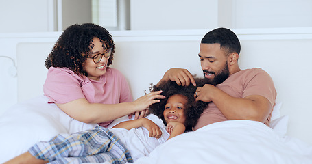 Image showing Home, bed and family with parents, boy or happiness with joy, bonding together and relax with a child. Mother, father or kid in a bedroom, funny or laughter with peace, morning or playing with humor