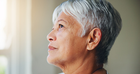 Image showing Senior woman, thinking and looking out window in memory, ambition or dreaming in retirement home. Closeup or face of mature female person in wonder, contemplating or thought for idea or hope at house