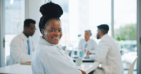 Image showing Portrait, black woman and doctors in a meeting, smile and healthcare with planning, hospital and teamwork. Face, professional and group with management staff, conversation and talking with medicare