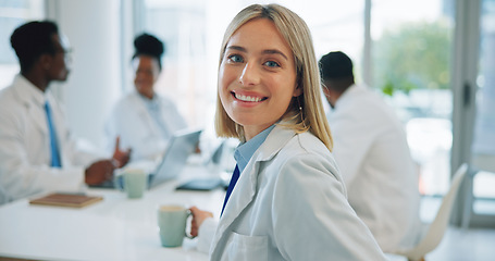 Image showing Portrait, woman and doctors in a meeting, smile and healthcare with planning, hospital and teamwork. Face, professional and group with management staff, research and brainstorming with medicare