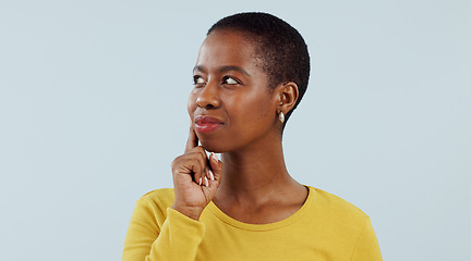 Image showing Happy black woman, face and thinking for solution, planning or brainstorming against a studio background. African female person in wonder, thought or contemplating decision, choice or idea on mockup