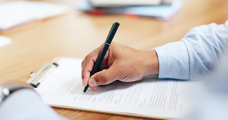 Image showing Closeup, hand and signature for clipboard in office for writing on legal form, compliance or application. Person, lawyer or document by information, reading or agreement by contract paperwork on desk