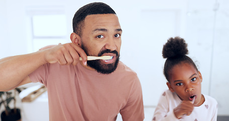 Image showing Dad, child and brushing teeth in morning routine, portrait and playful in bathroom, hygiene and wellness. Dental care, oral health and toothbrush with toothpaste for gum disease, cleaning and girl