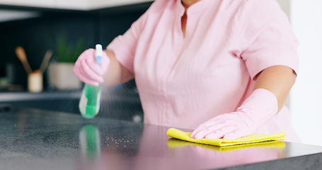 Image showing Cleaning, woman or spray on kitchen counter with detergent, housekeeper or service for home hygiene. Hands, person and cloth in housekeeping to shine, sanitizer and disinfectant for surface in house